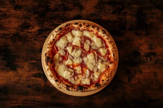 hawaiian pizza ham pineapple cheese golden crust