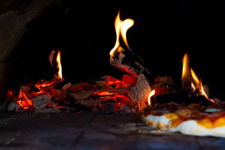 traditional wood fired pizza oven with flames